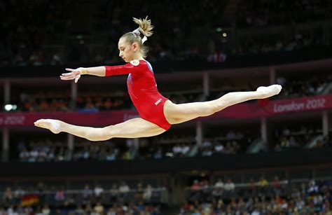 Russia's Victoria Komova competes in the women's gymnastics balance beam final in the North ...