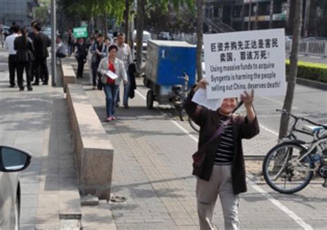 GRAIN | Photo essay: Demonstrators in Beijing protest acquisition of Syngenta in front of ...