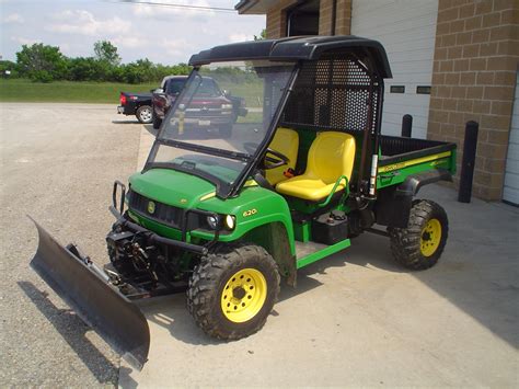 JOHN DEERE XUV 6251 GATOR W/SNOW PLOW & WINDSHIELD, 4X4, 192 HRS