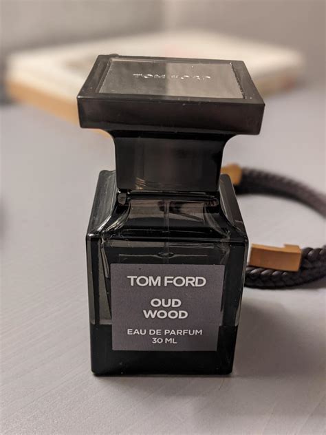 Oud Wood Tom Ford perfume - a fragrance for women and men 2007