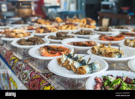 Seafood snacks at the food market Ballaro in Palermo Sicily Stock Photo - Alamy