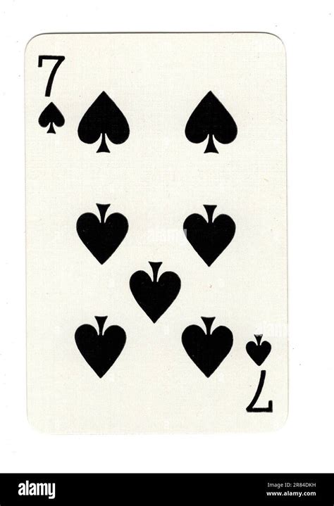 An seven of spades vintage playing card on a white background Stock Photo - Alamy