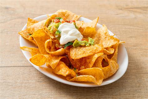 Mexican nachos tortilla chips with jalapeno, guacamole, tomatoes salsa and dip 3187629 Stock ...