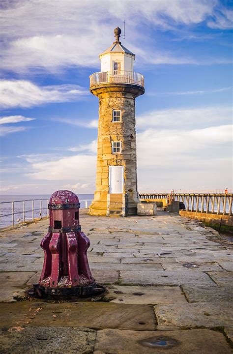 West Pier Lighthouse It is located in Whitby, UK built in 1831 of local sandstone, to a height ...