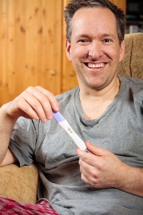 Man Holding A Pregnancy Test Stock Image - Image of future, results: 29945915