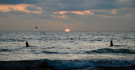 Silhouette Of People At The Beach · Free Stock Photo