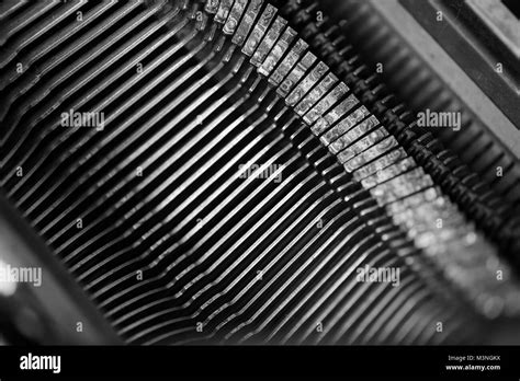 Different small metal elements of an old typewriter Stock Photo - Alamy