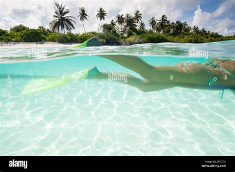 Woman snorkeling, Kadhdhoo Island, Laamu Atoll, Maldives Stock Photo - Alamy