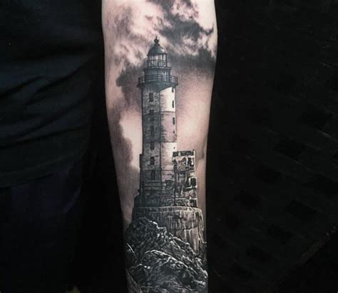 Lighthouse tattoo by Steve Butcher | Post 31589