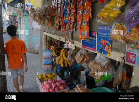 Packets of snacks and products on display at sari-sari store, Cebu ...