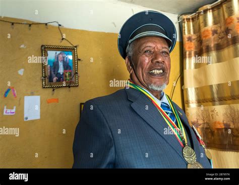 Ethiopian veteran from the italo-ethiopian war in army uniform in his home, Addis Ababa Region ...