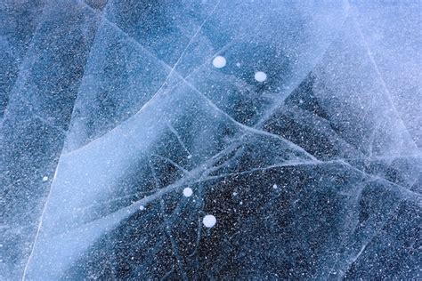 Premium Photo | Beautiful ice of lake baikal with abstract cracks