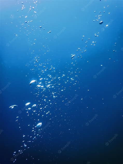 Premium Photo | Underwater air bubbles underwater blue background bubbles