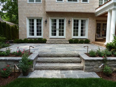raised stone patios - Google Search | Stone patio designs, Patio railing, Concrete patio