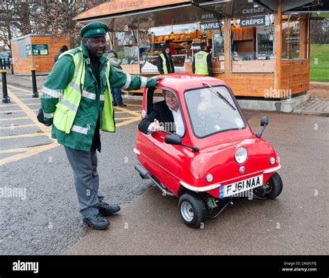 A Peel P50 the smallest car in the world is road tested around the streets and offices of ...