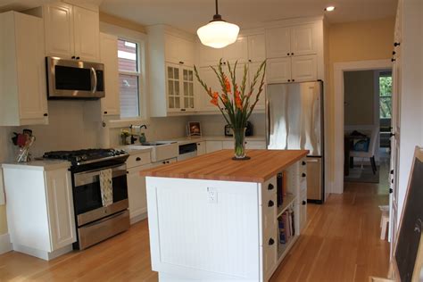 Charming white kitchen with IKEA cabinets - Transitional - Kitchen ...