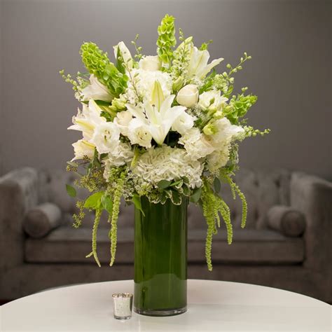 classic white floral arrangment by Paradise Florist