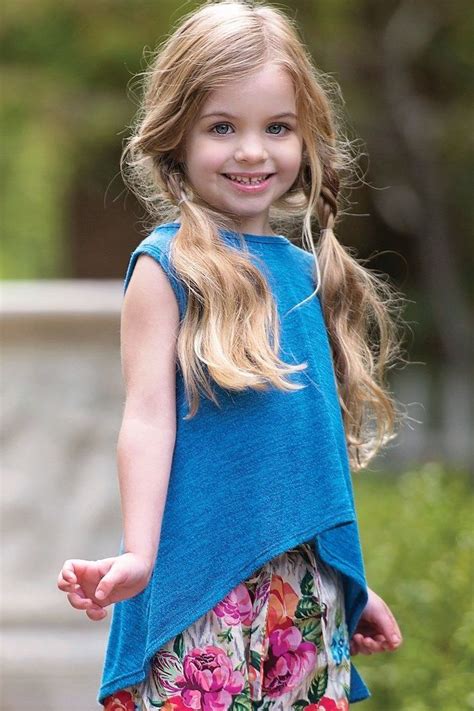 blue top, floral pants, cute braided hairstyles, long blonde hair, two messy ponytails | Little ...