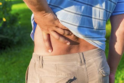 What Are the Causes of & Remedies for Stiff Back Muscles? | LIVESTRONG.COM