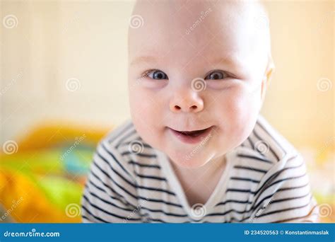 Smiling newborn baby stock image. Image of curious, happiness - 234520563