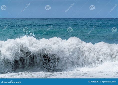 Huge waves of stormy sea stock image. Image of surf, spray - 75155757