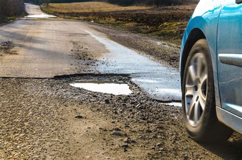 Why You Should Avoid Potholes in the Road - DeBroux Automotive