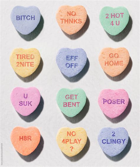 "Mean Valentine Candy Hearts" by Stocksy Contributor "Sean Locke" - Stocksy