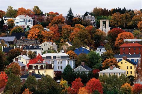 Autumn in Rhode Island, fall foliage and houses on a hillside in ...