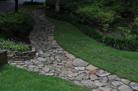 Attractive Drainage Swale | Backyard drainage, Sloped garden, Landscape ...