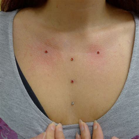 Fresh clavicle and healed sternum micro dermal piercings | Dermal piercing, Piercings, Belly ...