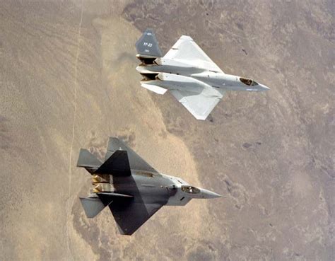 USAF YF-23 and YF-22 side-by-side during the Advanced Tactical Fighter competition flight ...