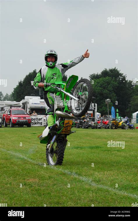 Motorcycle Wheelie Stunt Stock Photo - Alamy