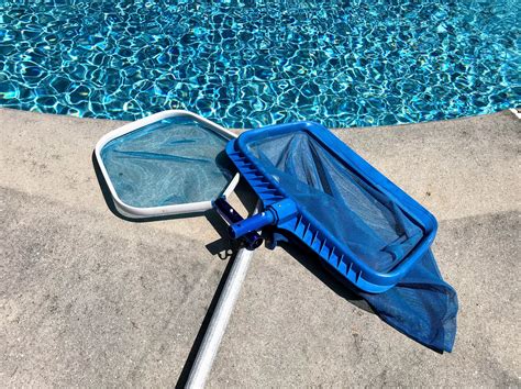 Two of the most essential pieces of swimming pool cleaning equipment is a leaf skimmer net and a ...