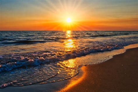 Sunset beach sunrays stock image. Image of evening, color - 133301221