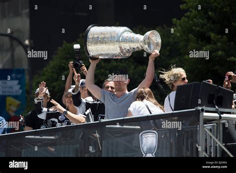 Goalie Jonathan Quick holds Stanley Cup, LA Kings 2014 Victory Parade ...