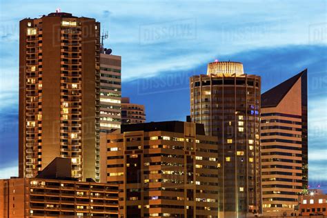 Canada, Alberta, Edmonton, Skyscrapers against moody sky - Stock Photo ...