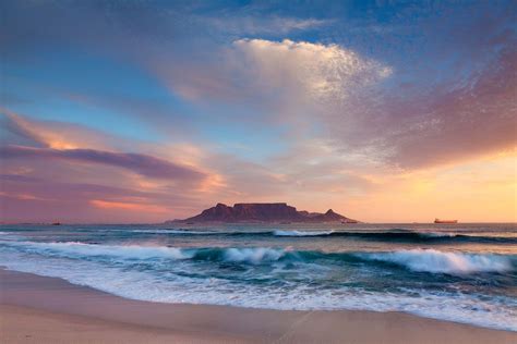 landscape photograph of a typical blouberg beach scene of sunset over table bay looking… | South ...