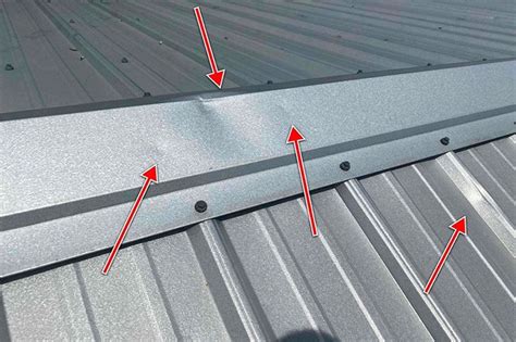 Metal Roof Hail Damage - RestoreMasters Contracting