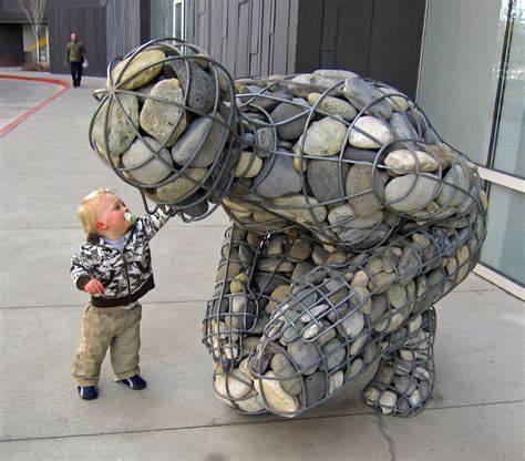 Gabion river stone sculpture | Street art, Sculpture art, Stone art