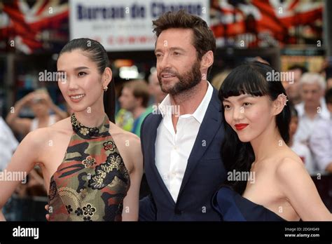 Tao Okamoto, Hugh Jackman and Rila Fukushima (right) arriving at the UK ...