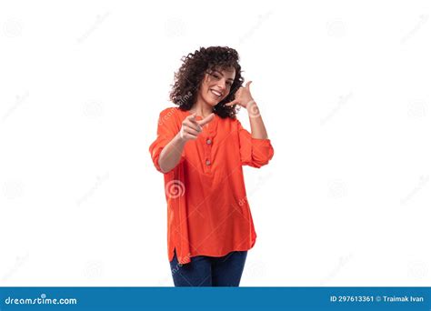 Young Stylish Curly Caucasian Brunette Woman Dressed in an Orange ...