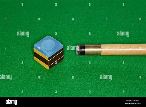 Snooker cue and chalk Stock Photo - Alamy