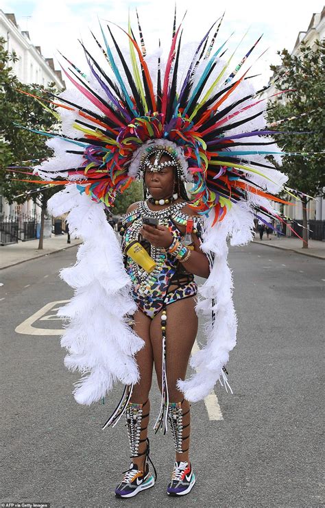 Notting Hill Carnival Day 2: Performers head out in flamboyant outfits ...