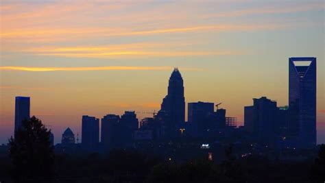 Sunset And Sunrise Over Charlotte City Skyline North Carolina Stock ...