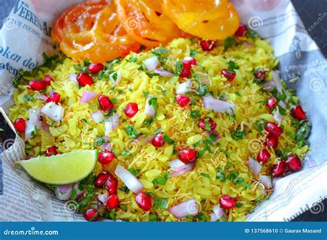 Indian Street Food Breakfast Poha Jalebi Stock Photo - Image of sweet, newspaper: 137568610