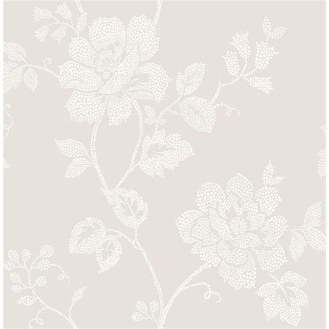 a white flower pattern on a light gray wallpaper with lots of small ...