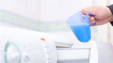 Why your washing machine smells, and how to clean it