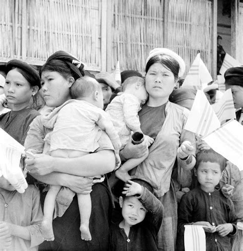 1950 Group of women and children holding State of Vietnam … | Flickr