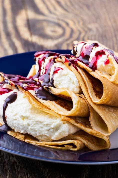 Sweet Cheese-Filled Crepes - Classic thin, quick-cooked crepes filled with a sweet cotta… in ...