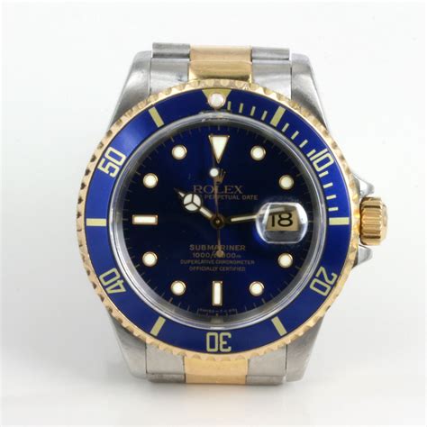 Buy Blue dial Rolex Submariner in gold & steel - Kalmar Antiques